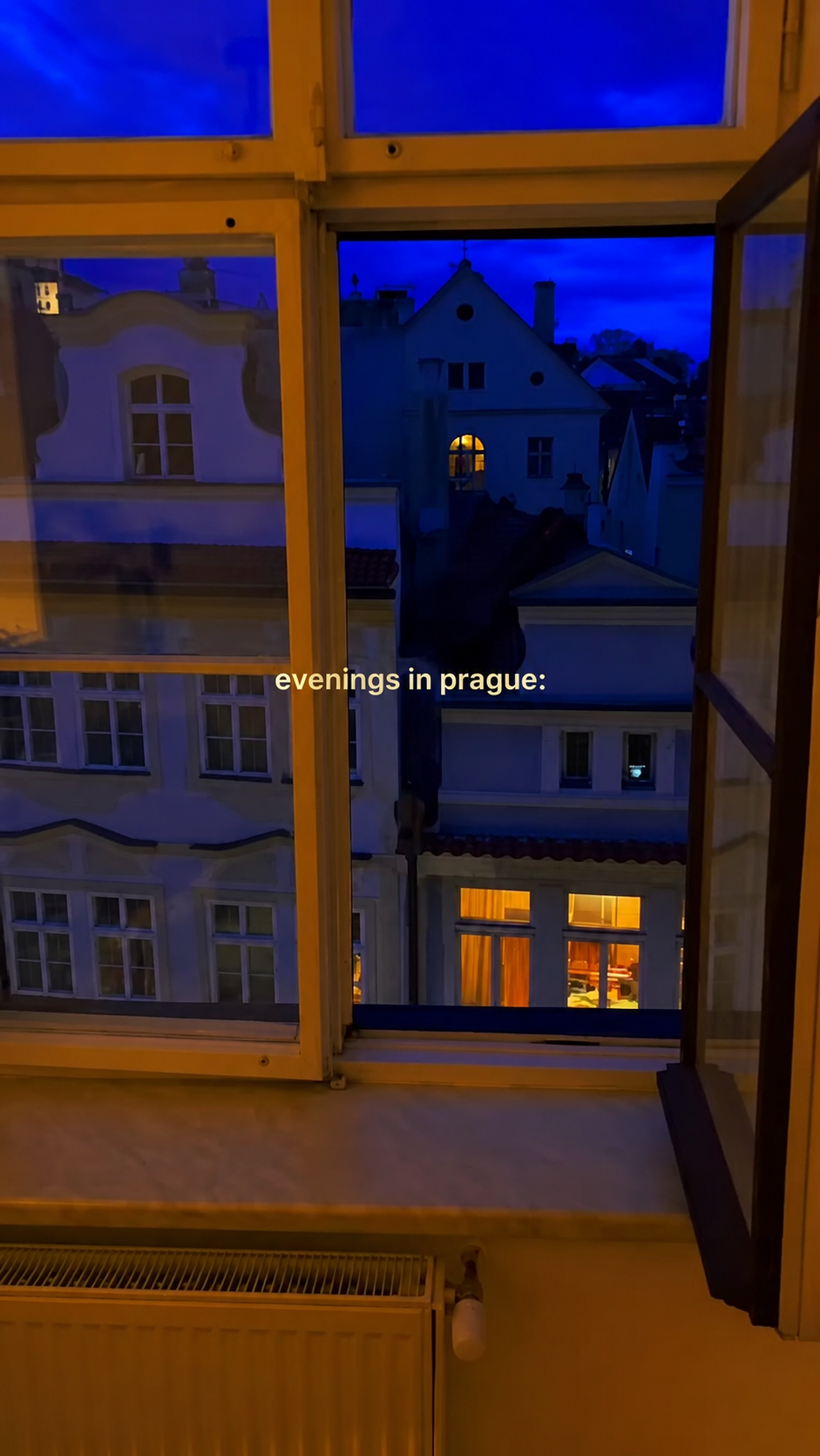 Blue-hour Prague view from the residence, the cover of the viral Instagram reel